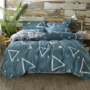 King size blue duvet set with white geometric triangle patterns and striped accents from decorbites cartoon king