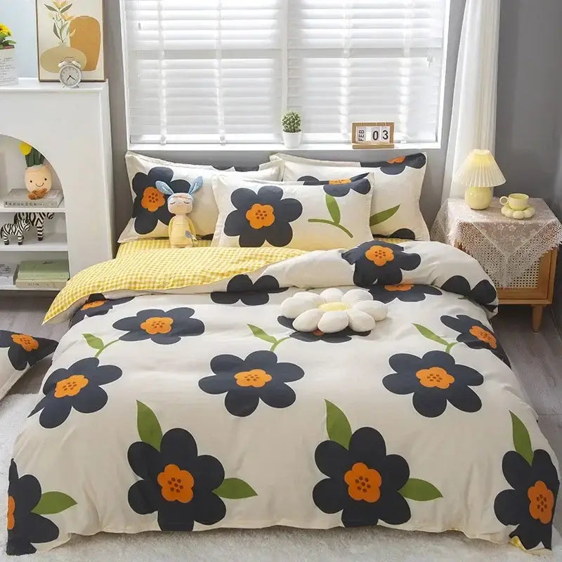 Cream-colored king size duvet set with bold navy blue and orange floral pattern on soft textured fabric by decorbites cartoon king