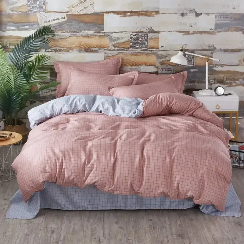 King size duvet set with pink and blue checkered pattern and matching pillowcases from decorbites cartoon king collection