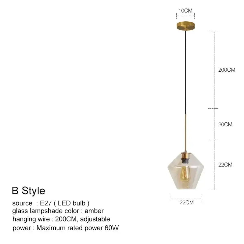 A modern pendant light with brass metal frame and amber geometric glass chandelier lighting for kitchen use