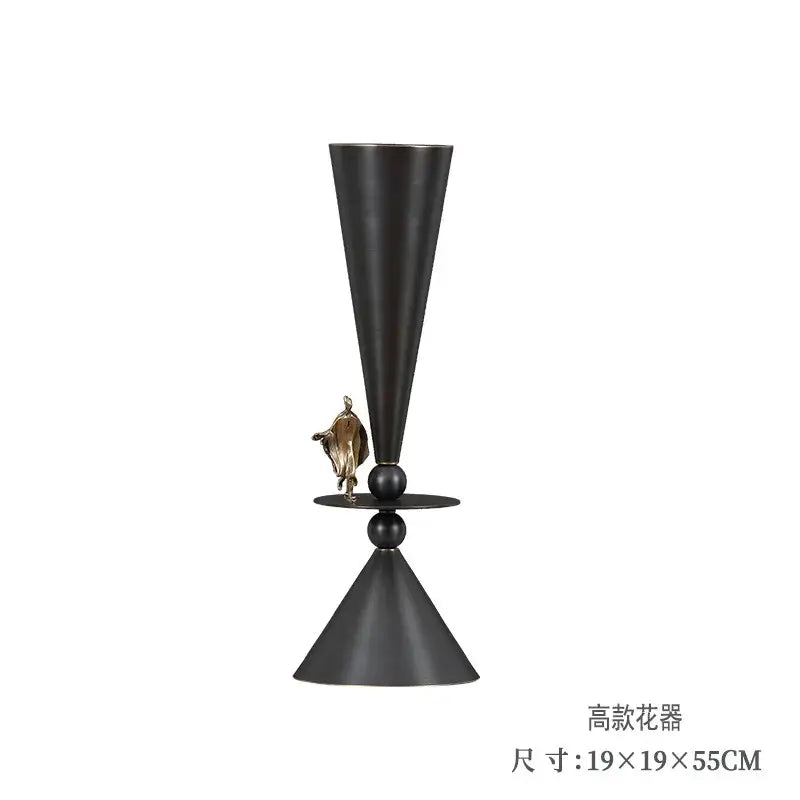 Black matte geometric bronze vase with conical shape and gold figurine decorbites geometric bronze decor piece