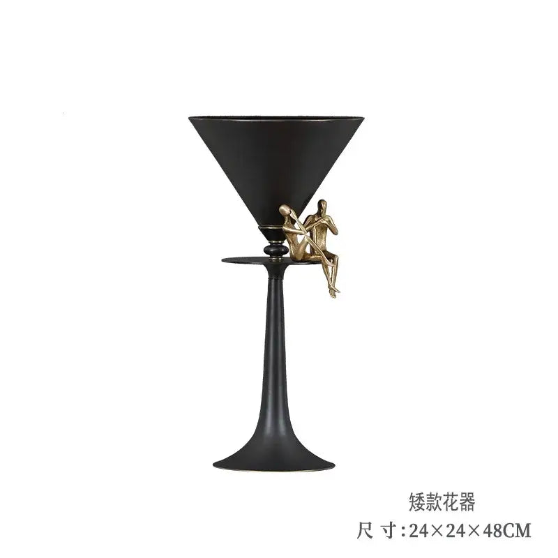 Black martini glass-shaped geometric bronze vase with gold-toned sculptural figure for decorbites geometric bronze decor