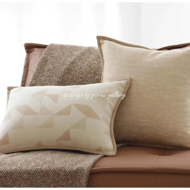 Cream-colored geometric brown leather splicing throw pillow cover with textured linen fabric and beige triangle pattern decorbites geometric brown