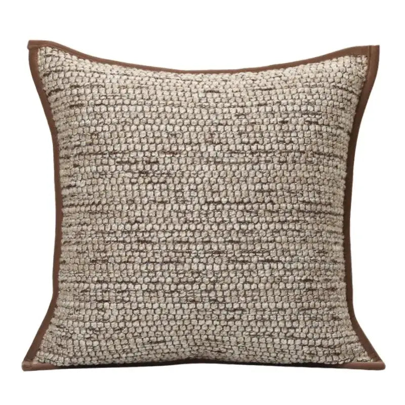 Beige and brown woven throw pillow with chunky knit pattern and geometric brown leather splicing for living room decorbites