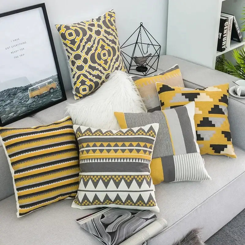 A collection of decorbites geometric canvas cotton cushion covers in yellow gray black and white for living room decor