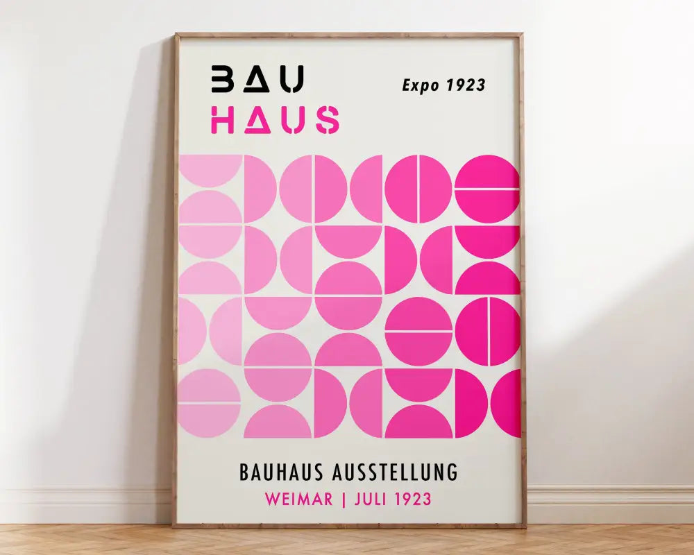 A framed DecorBites™ bauhaus geometric canvas print with bold pink circles for modern home decor