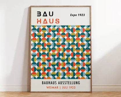 A framed DecorBites™ bauhaus geometric canvas print featuring teal orange and yellow overlapping circles for home decor