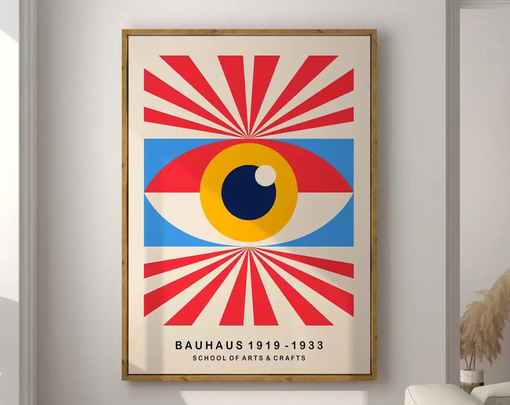 A framed bauhaus geometric canvas print featuring a bold eye design with red and blue rays for home decor