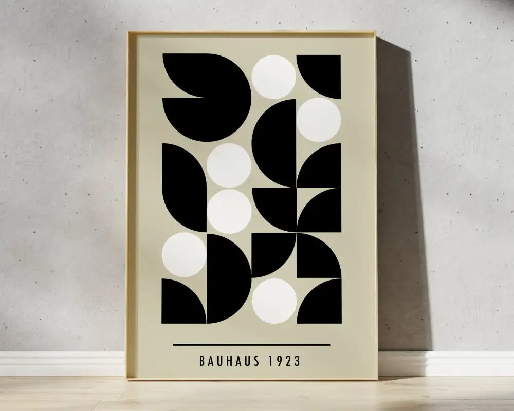 Decorbites bauhaus geometric canvas prints featuring bold black and white shapes in a light wood frame for home decor