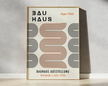 Decorbites™ bauhaus geometric canvas prints feature bold black and orange patterns on cream canvas in a light wood frame