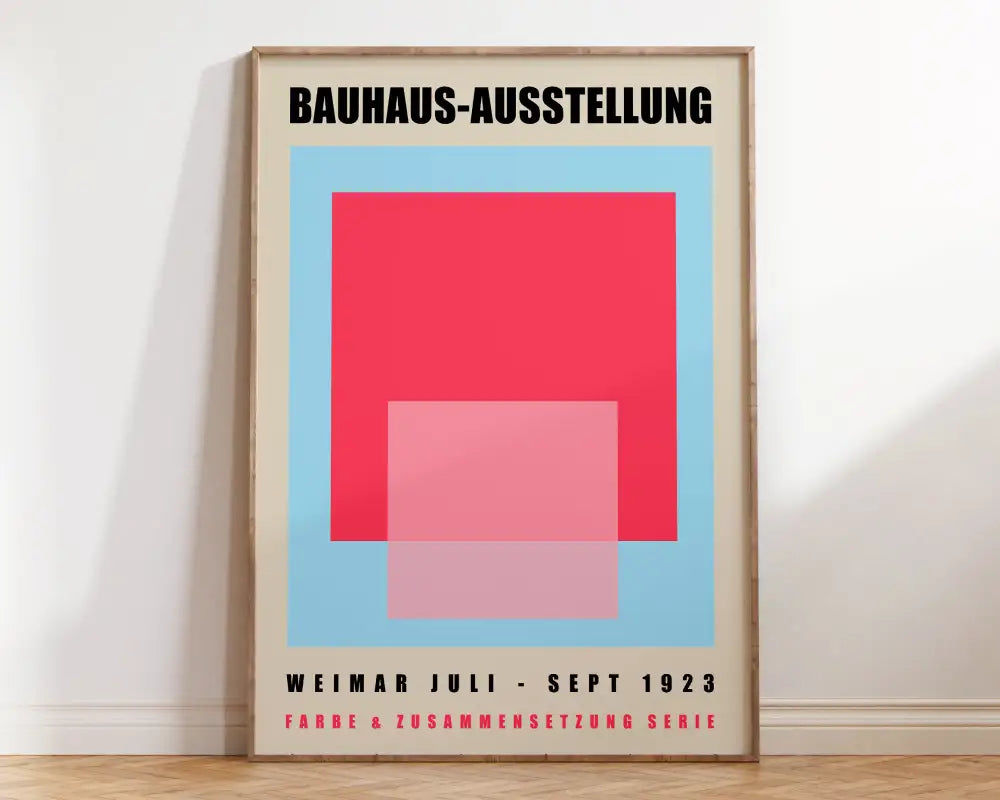 Minimalist bauhaus geometric canvas print with bold red and pink shapes on light blue for modern home decor