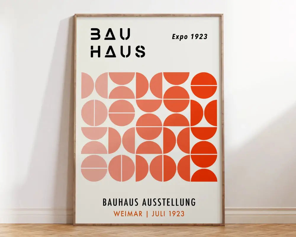 A decorbites bauhaus geometric canvas print with black text and orange pink semi circles for home decor