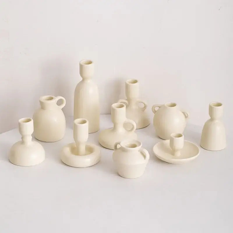 A cream geometric ceramic candle holder set with minimalist modern design for living room decorbites decor