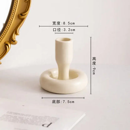 Cream-colored geometric ceramic candle holder with smooth matte finish for living room decorbites ceramic candle holder set