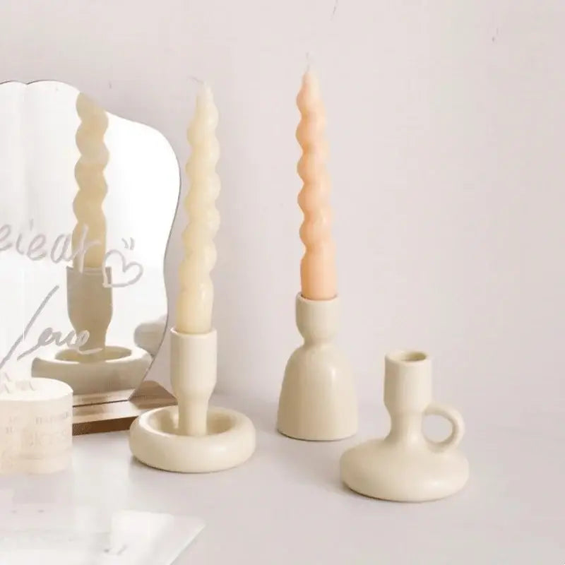 Cream-colored geometric ceramic candle holder set with twisted tapered candles for living room decorbites decor