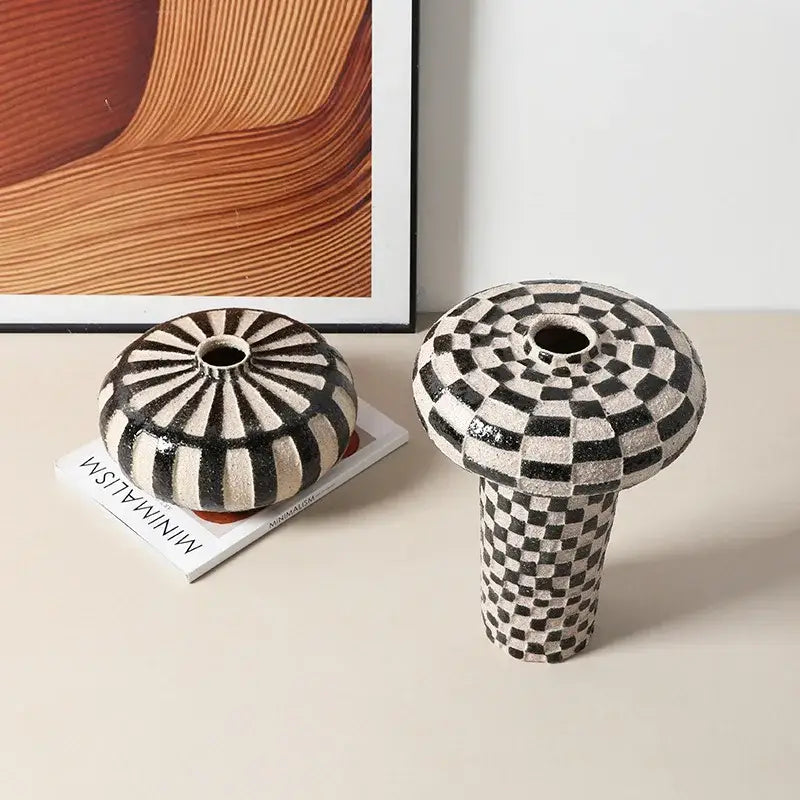 Two black and white ceramic vases with geometric check and radial stripe patterns for living room decorbites geometric check