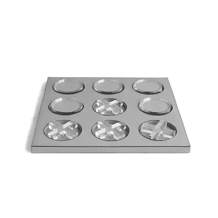 Silver metallic tic-tac-toe game board with clear pieces on a geometric checkerboard grid leather coaster set for home decor