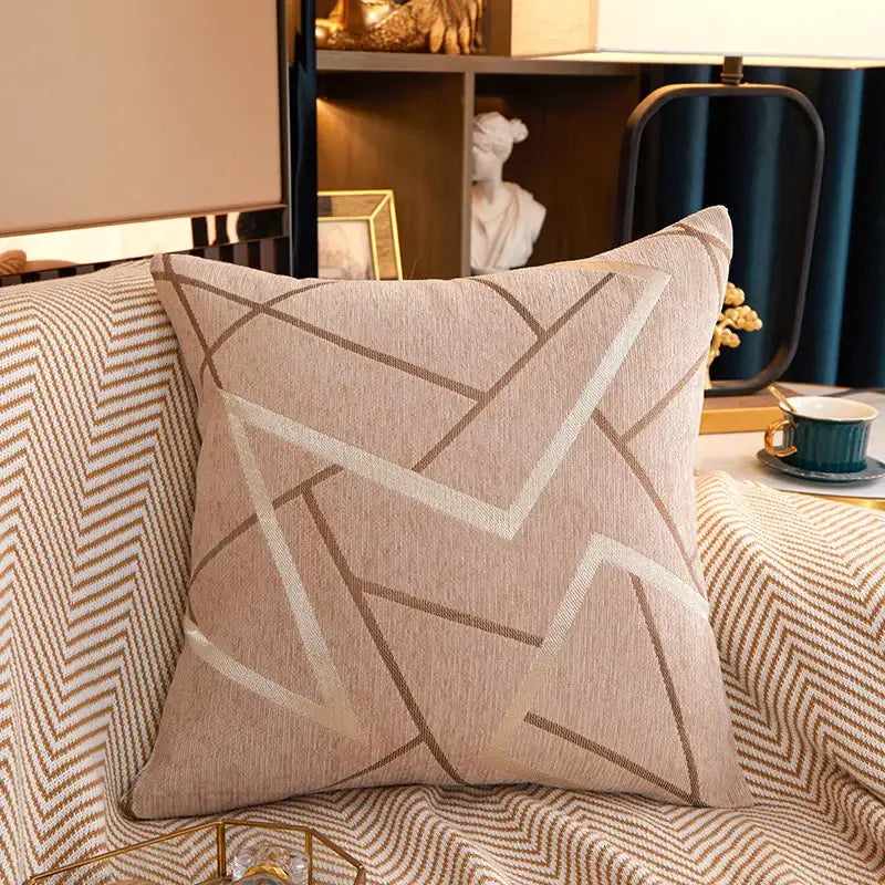 Beige throw pillow with cream and taupe geometric triangle pattern and textured fabric in decorbites geometric chenille cushion cover