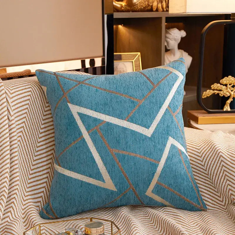 Blue throw pillow with white and gold-trimmed geometric chenille cushion cover for decorbites living room decor