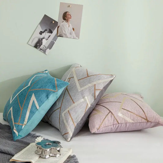 Three decorative throw pillows with decorbites geometric chenille cushion covers in teal gray and blush pink hues for living room decor
