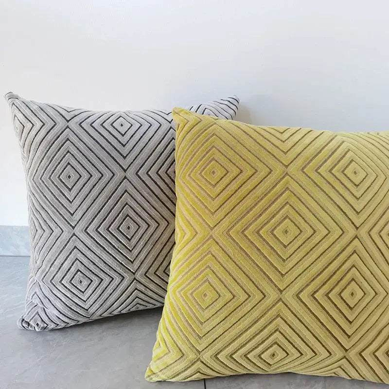 Two square chenille flocking cushion covers in muted gray and vibrant yellow with geometric embroidery for living room decorbites decor