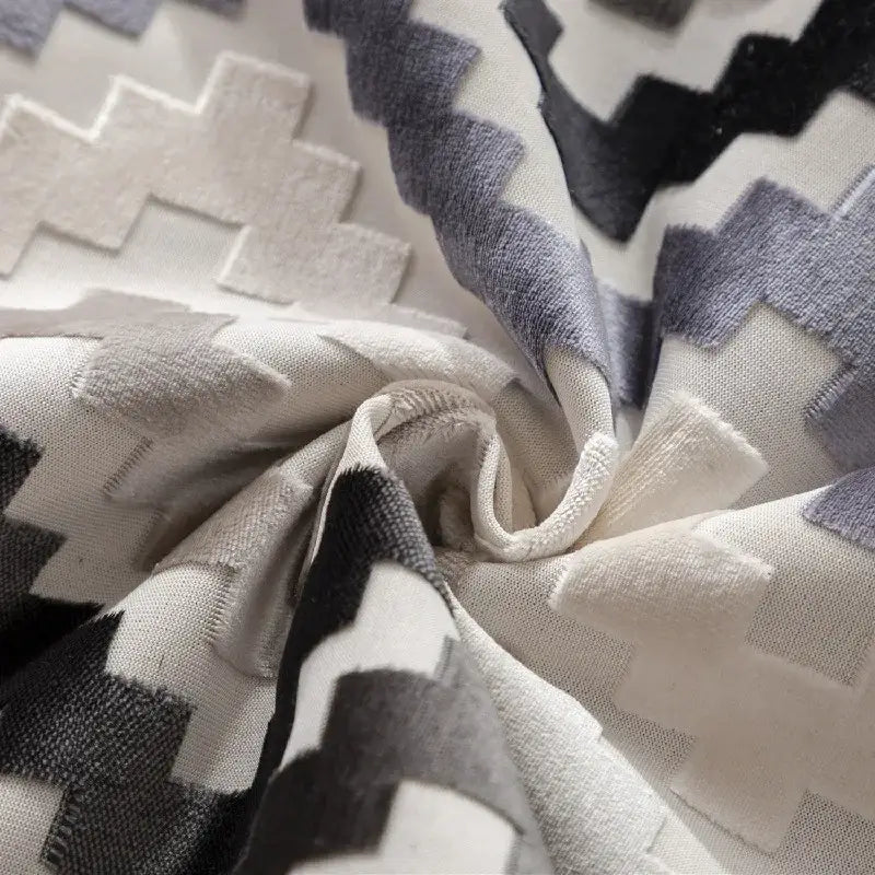 Cushion cover with decorbites geometric chenille flocking in grey and beige featuring a textured zigzag pattern