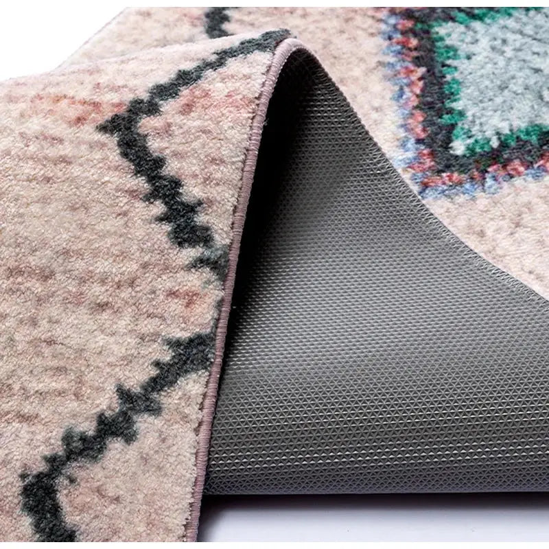 Beige and black geometric patterned decorbites boho runner rug with plush surface and gray non slip backing for entryway