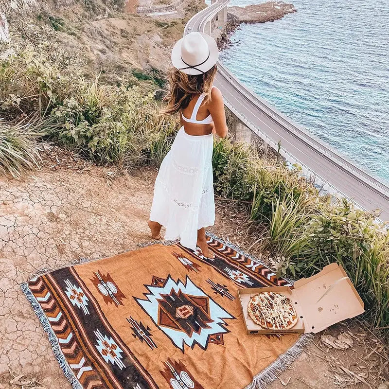 A tan woven geometric cotton knitted sofa blanket with brown black and light blue patterns for living room decorbites geometric cotton