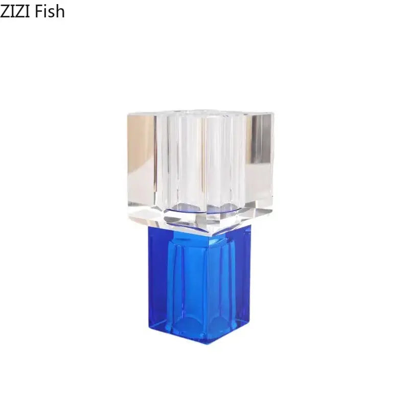 Geometric crystal glass vase with clear top and blue base designed for artificial flowers living room decorbites decor
