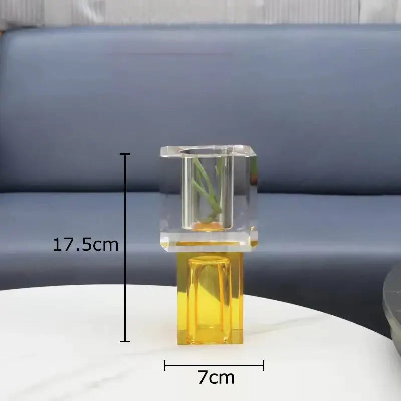 Transparent acrylic crystal glass vase with golden yellow base and clear upper section holding artificial flowers decorbites crystal glass