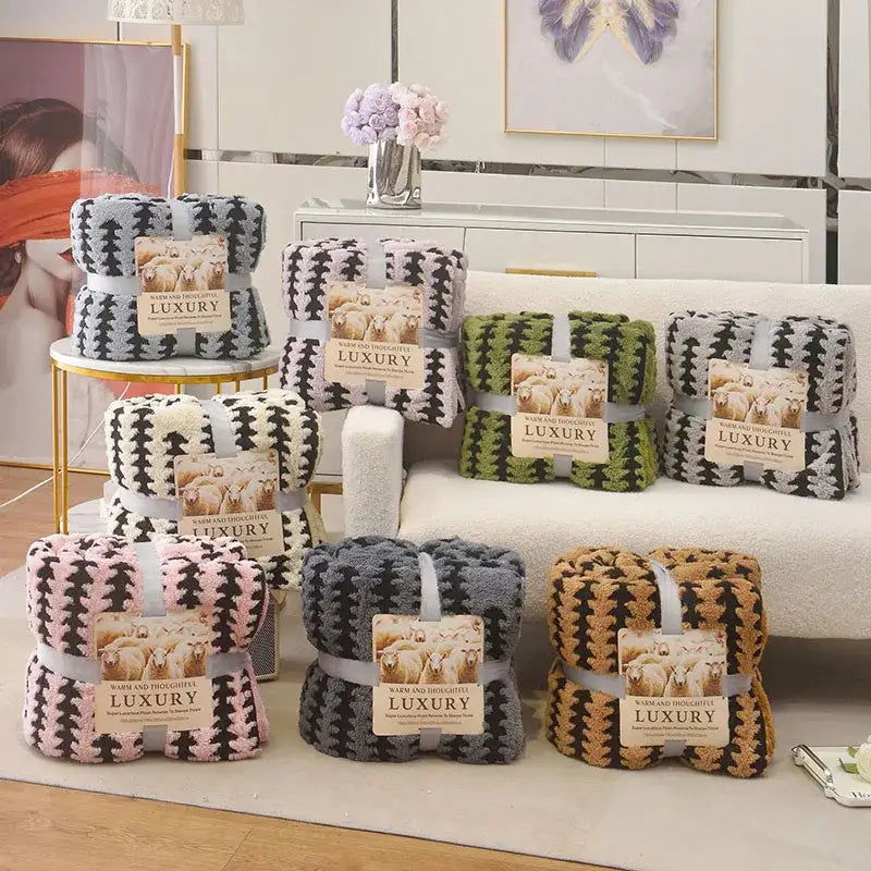 Plush geometric double layer lamb fleece blankets in various colors and black and white or brown and beige patterns for bedroom throw