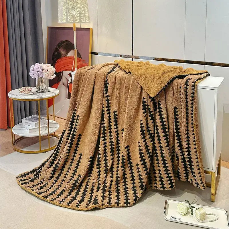 Tan and black patterned geometric double layer lamb fleece blanket with soft textured surface for bedroom throw use