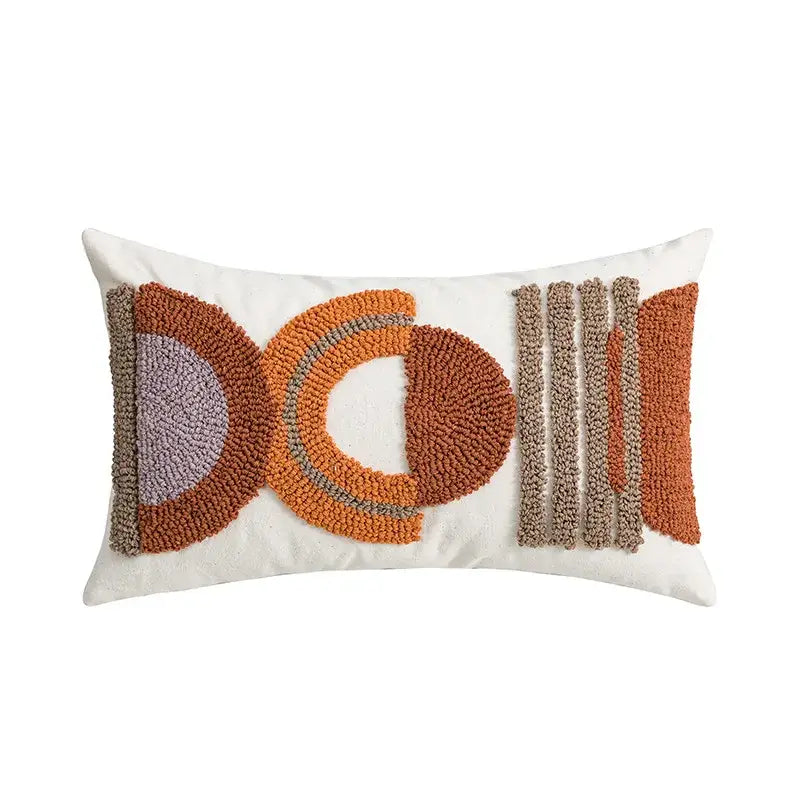 Rectangular white cushion cover with textured orange brown and gray geometric embroidered design for home decor by decorbites