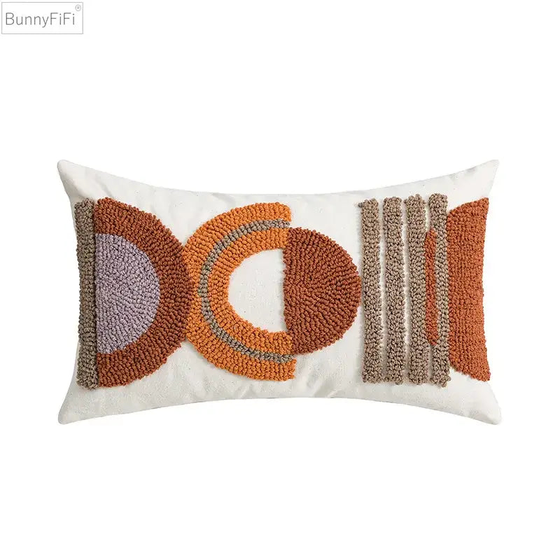 Bunnyfifi geometric embroidered cushion cover with abstract tufted design in orange brown and muted purple for home decor