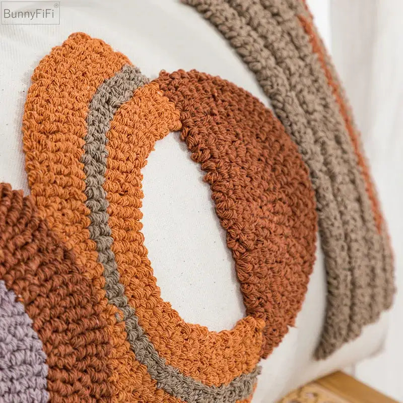 Cozy hand-crocheted orange and beige circular cushion cover with chunky knit pattern for home decor by decorbites geometric embroidered