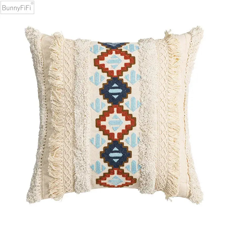 Cream-colored cushion cover with frayed edges and red blue beige geometric embroidery for home decor by decorbites geometric embroidered