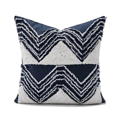 Navy and cream cushion cover with textured layered zigzag embroidery and tufted tassels decorbites geometric embroidered decor