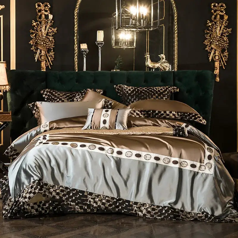 Luxurious embroidered Egyptian cotton bedding set in muted gold and silver with black and gold geometric trim