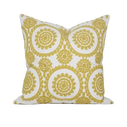 A geometric embroidered noble white cushion cover with mustard-yellow floral patterns for decorbites cushion covers