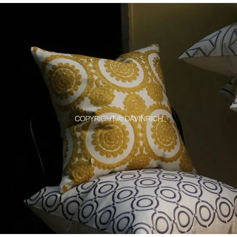 A square white cushion cover with intricate gold geometric embroidered noble patterns for living room decorbites