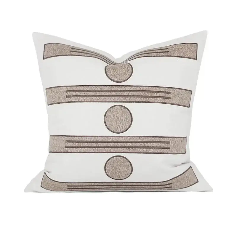 White throw pillow with beige embroidered stripes and circular accents for decorbites geometric embroidered cushion covers