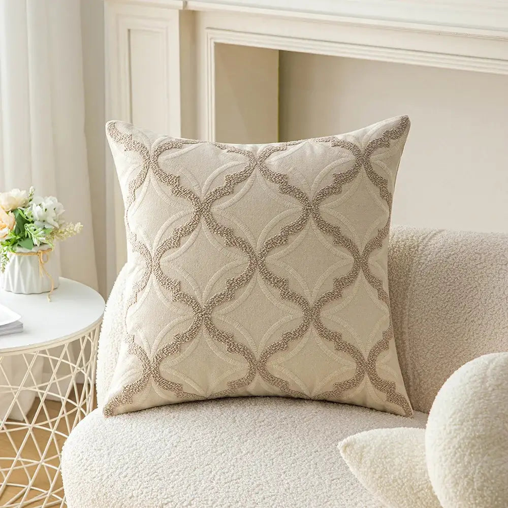 Beige cushion cover with intricate taupe geometric embroidery for living room decor featuring decorbites geometric embroidery