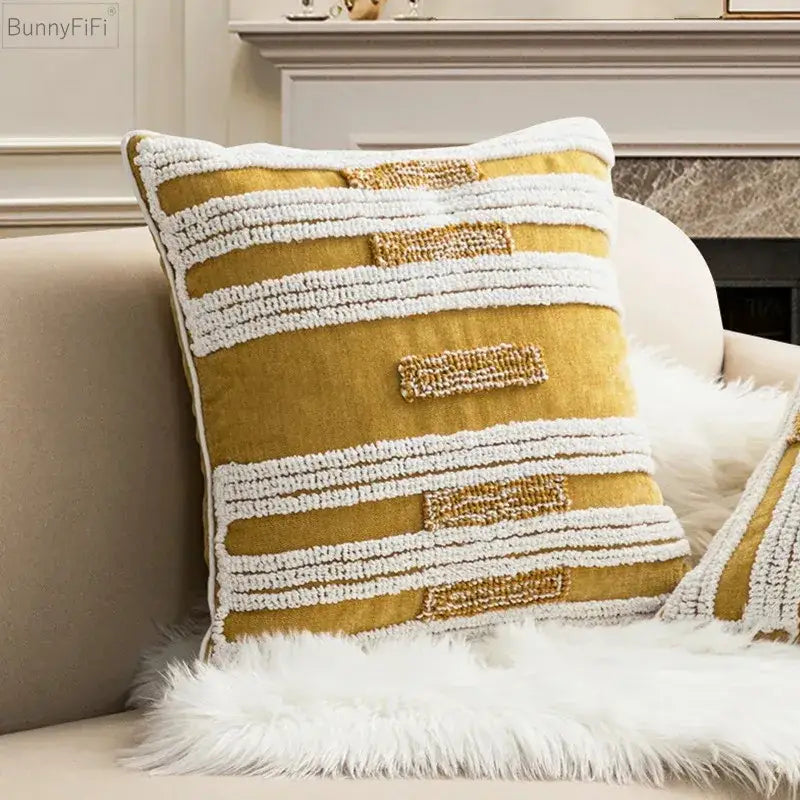 Mustard yellow cushion cover with white and gold textured stripes and decorbites geometric embroidery circle accents