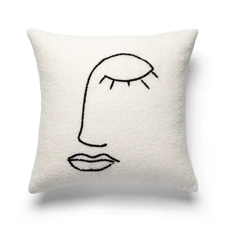 Cream-colored plush cushion cover with minimalist black geometric embroidery decorbites geometric embroidery design