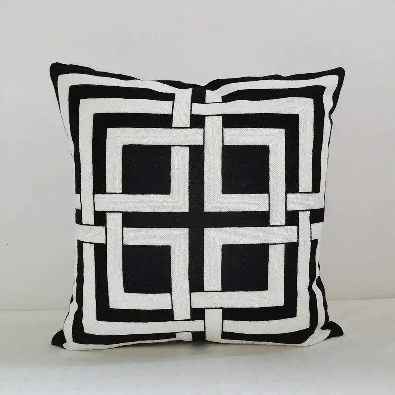 Black and white geometric embroidery cushion cover with bold interlocking square pattern for decorbites living room decor