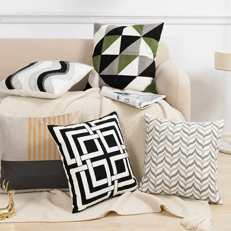 Set of four modern geometric embroidery cushion covers in black white gray and olive green for living room decorbites decor
