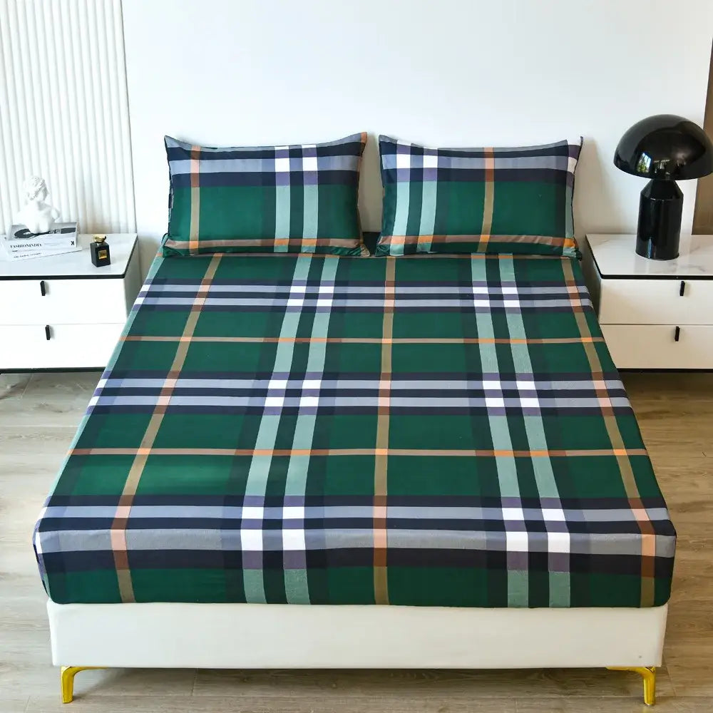 Green plaid sheet set with navy white and beige stripes complementing decorbites geometric figure bedding