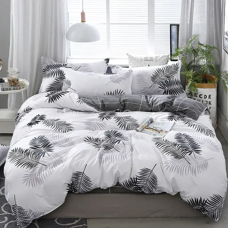 White duvet cover bedding set with black and gray tropical leaf patterns decorbites geometric floral design