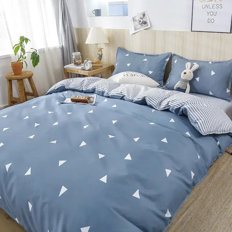 Blue duvet cover with white triangular patterns from decorbites geometric floral bedding set for stylish bedroom decor