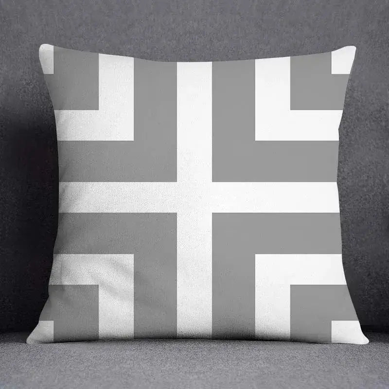 A square pillow case with a gray and white geometric floral print featuring intersecting stripes for living room decor